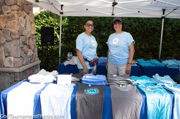 Volunteers at Registration at a golf tournament in San Diego by Donna Coleman Photography